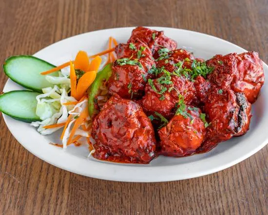 Chicken tikka kebab roll wrapped in kabuli bread at Papa Nash's in Airdrie, AB